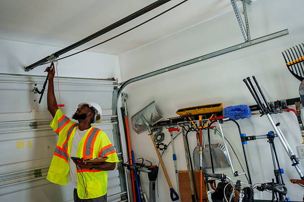Professional Garage Door Panel Replacement technician working in Austintown, OH